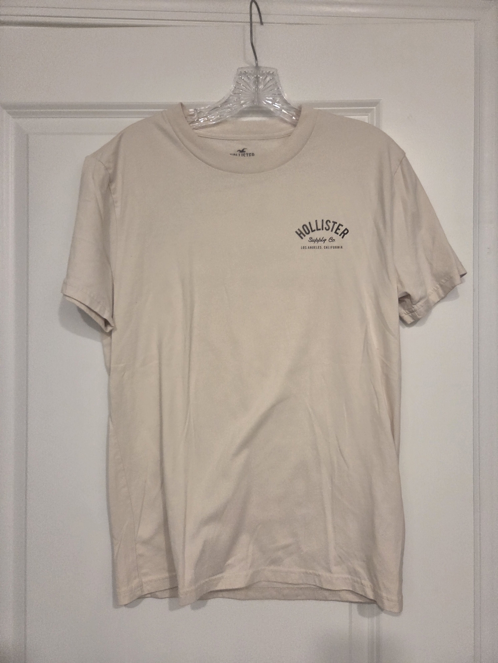 Hollister Men's Crew Neck Tee in Light Beige with Small Chest Logo